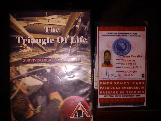 Jesus Peralta, ARTI (American Rescue Team International) Badge and a copy of The Triangle of Life video used to train, in Ilo.
